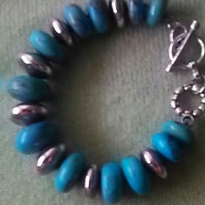 Touraoise and sterling oval beads.BracelePreowned.